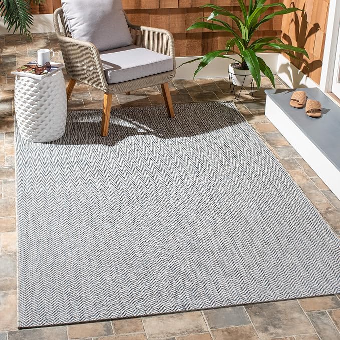 SAFAVIEH Outdoor Area Rug 5'3"x7'7" by Unknown